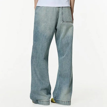 Wide-Leg Washed Blue Jeans with Side Strap Detail